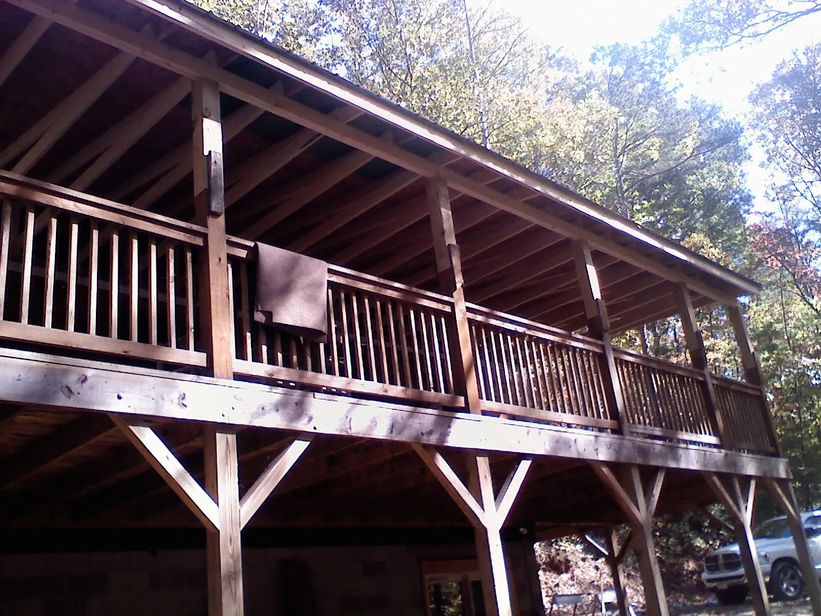 Timber framing under a new elevated porch and deck — Roof Leak Repair in New Melle by Roofing Brothers